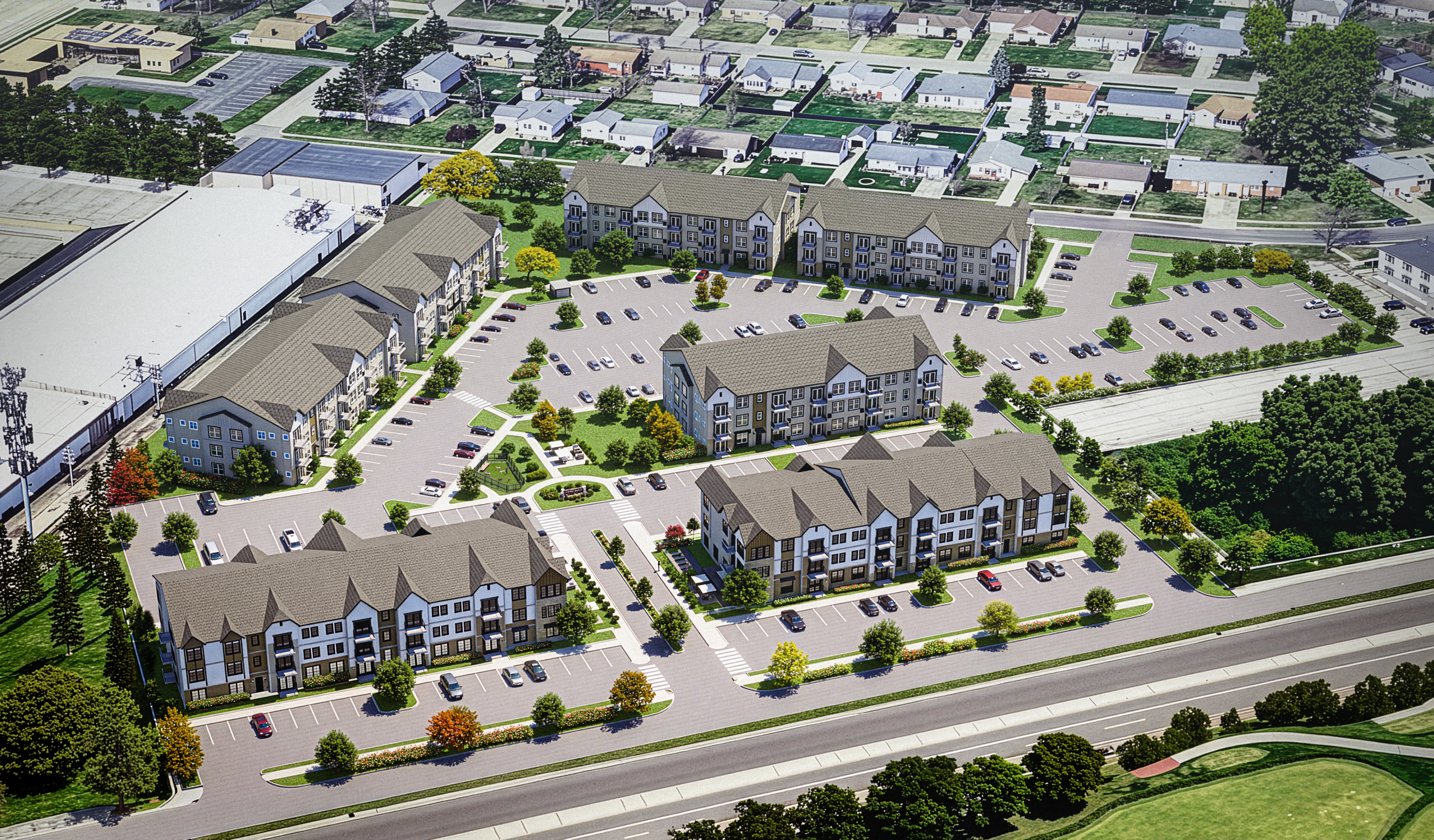 A large apartment complex with multiple buildings and parking lots.